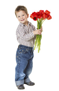 Boy with bouquet of tulips